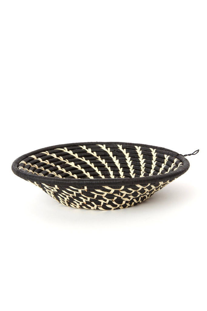 Handwoven coiled African wall baskets with cream swirls