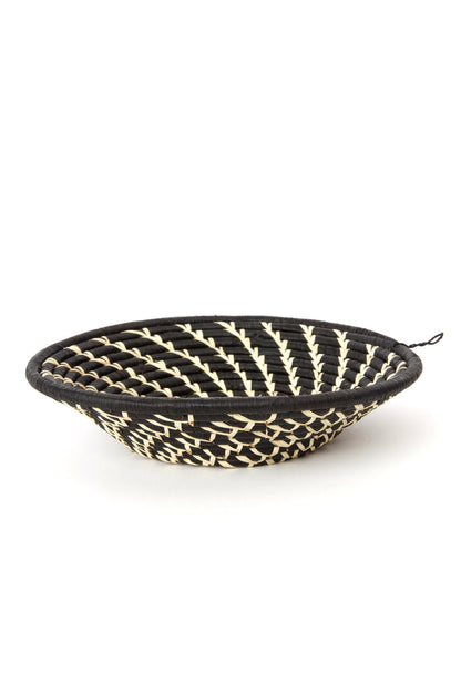 Handwoven coiled African wall baskets with cream swirls